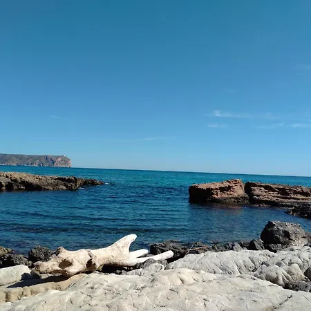 En Playa De El Arenal, *